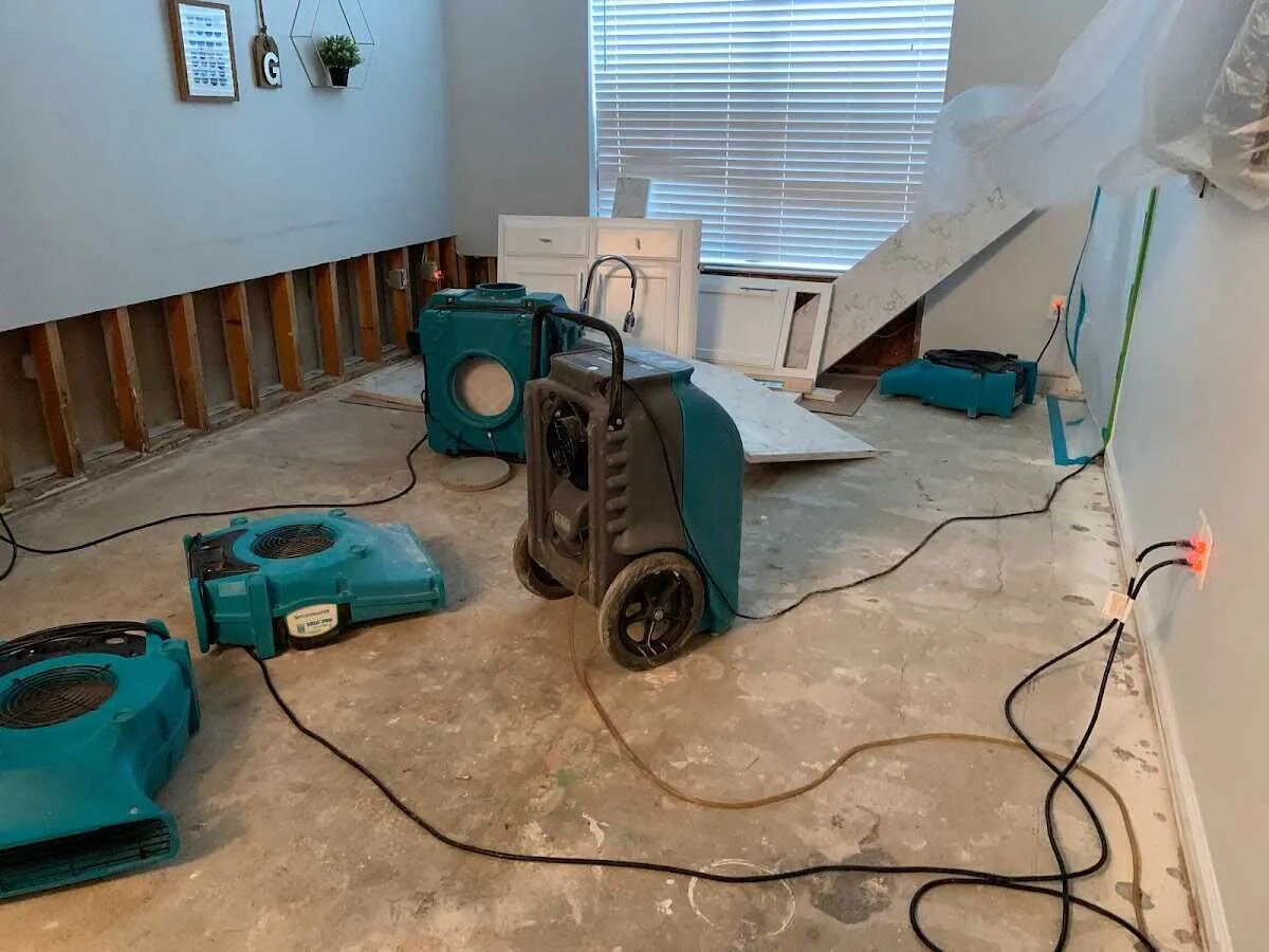 Dehumidifier in flood-cut room for Water Damage Restoration in New London